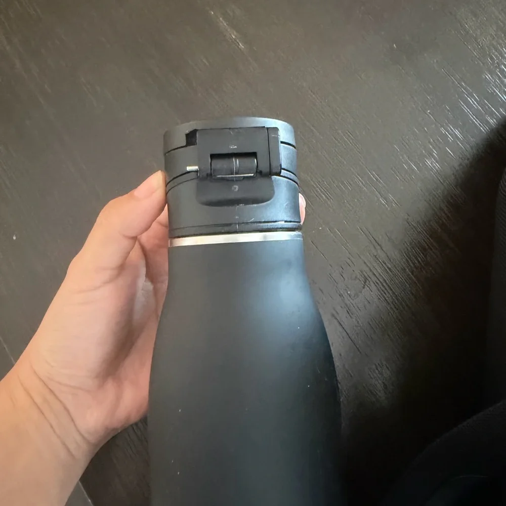 Lululemon Athletica Black city essentials Duffel Bag and water bottle